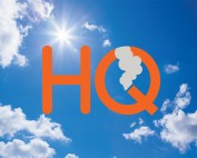 The logo for Happy Quitter UK against a blue sky.